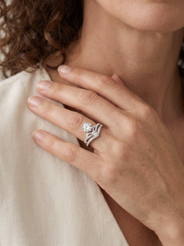 Silver-tone crown-style ring with clear accents, shared appearance image 2