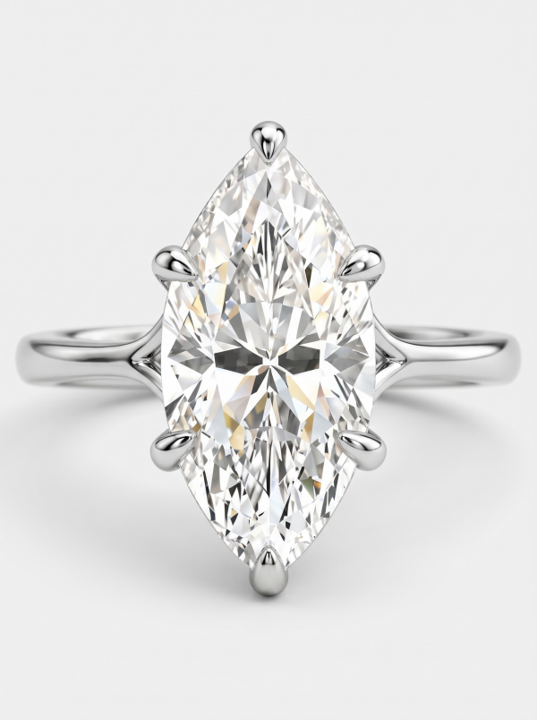White gold plated moissanite ring with an elongated clear center and a slim band